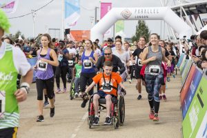 A picture showing Parallel Windsor challenge event winners crossing the finish line